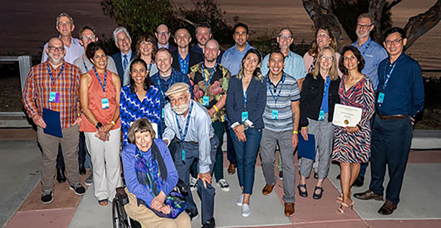 Group of individuals holding award certificates after being recognized for acheivement at the 2022 UC Tech conference in San Diego, CA